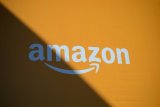 Amazon вдвое повысил минимальную зарплату своим сотрудникам