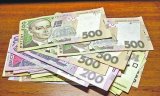 НБУ на 21 лютого послабив курс гривні до 27,07