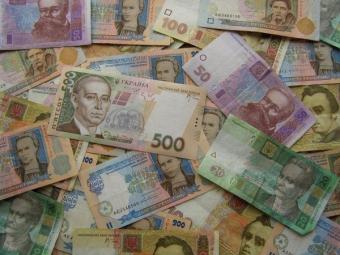 НБУ на 21 грудня послабив курс гривні до долара до 26,47