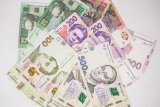 Котирування гривні підскочили на міжбанку