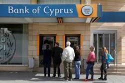 Cyprus again loosens restrictions on banking transactions