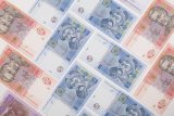 Гривня ослабла на закритті міжбанку