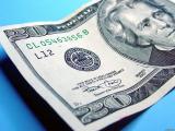 НБУ 9 грудня купував долари по 23 грн.