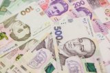 Курс гривні на міжбанку знизився до 28,43 за долар