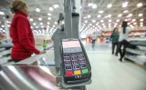 Власники карт зможуть знімати гроші в касах магазинів, Росія