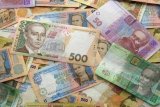 НБУ на 28 серпня послабив курс гривні до 25,55 грн/долар