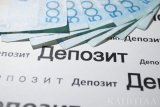 Депозиты казахстанцев медленно перетекают в иностранные банки