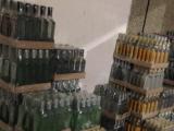 Фальсифікованим алкоголем з вінницьких гаражів торгували через Інтернет
